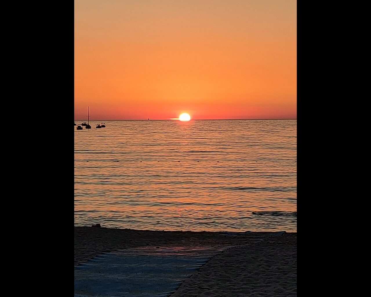 12 Coucher du soleil depuis la plage d'Orcino