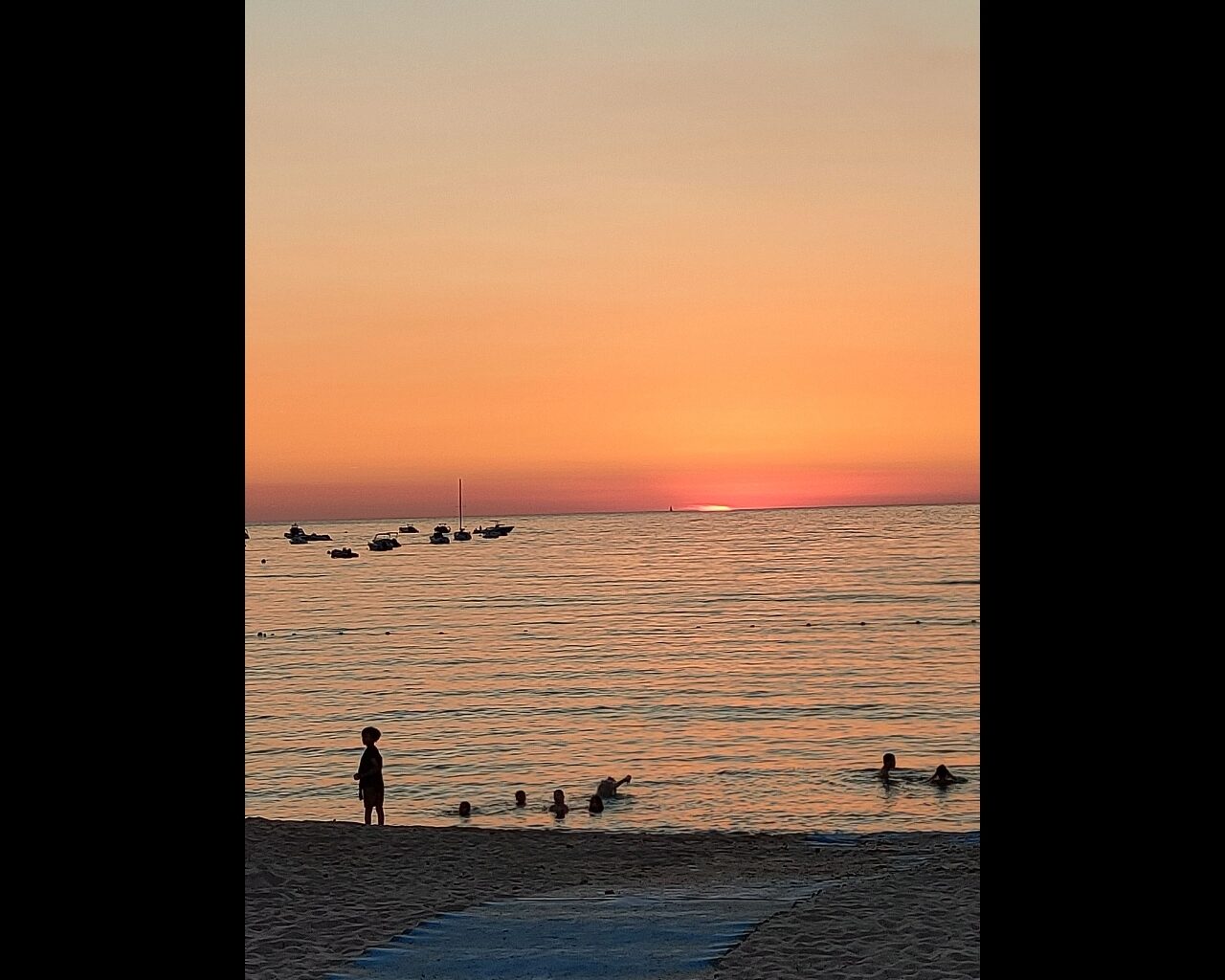 18 Coucher du soleil depuis la plage d'Orcino